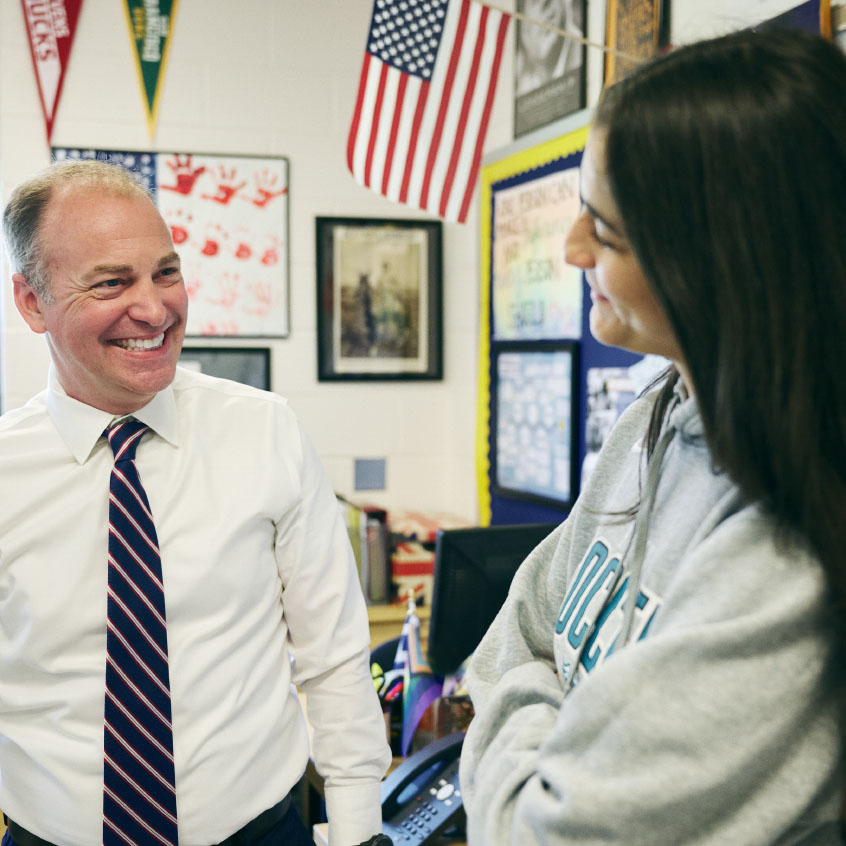 Teacher interacting with student