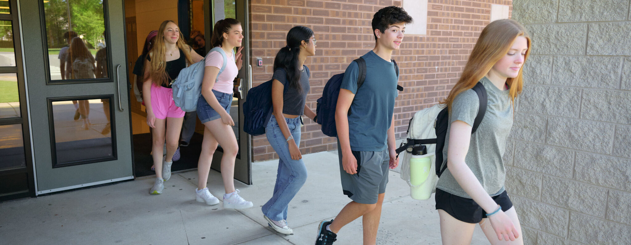 Students walking outside school